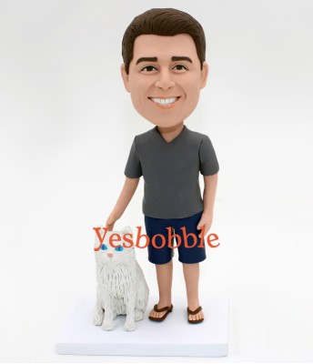 Man In Shorts and T-shirt with a Pet Bobblehead