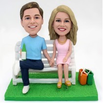 Couple Sitting On The Chair Bobblehead
