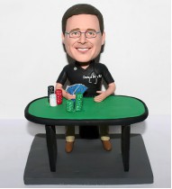 Bobblehead Sitting At A Gambling Table