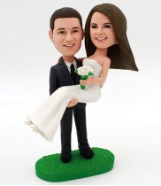 Groom Carries Bride Bobblehead Wedding Cake Topper