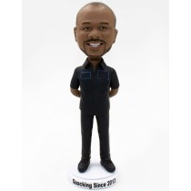 Bobblehead in Uniform Hands Behind the Back