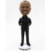 Bobblehead in Uniform Hands Behind the Back